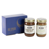 Two jars of Big Spoon Roasters nut butter next to a blue box