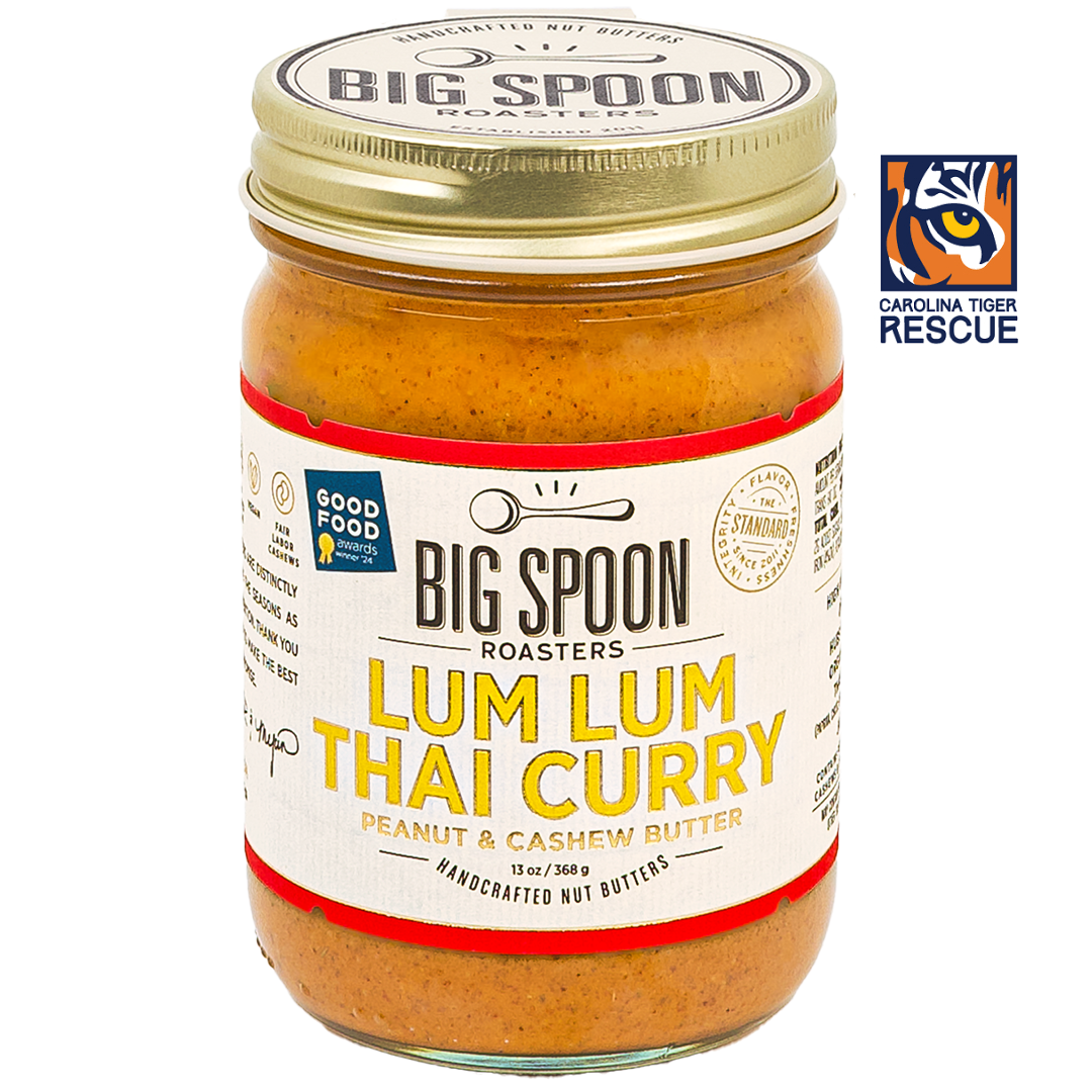 Jar of Lum Lum Thai Curry Peanut & Cashew Butter with Carolina Tiger Rescue Logo