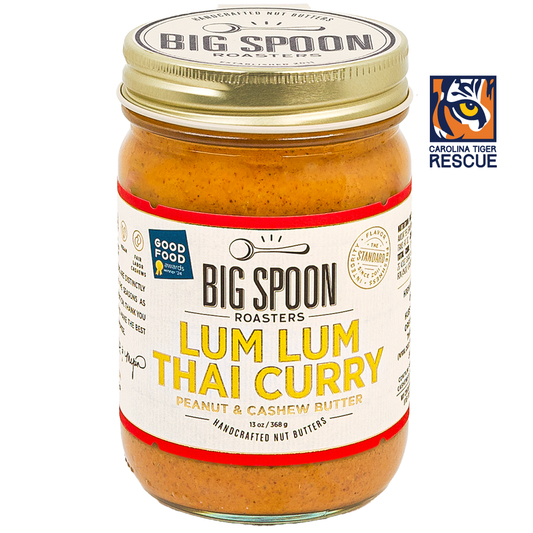 Jar of Lum Lum Thai Curry Peanut & Cashew Butter with Carolina Tiger Rescue Logo