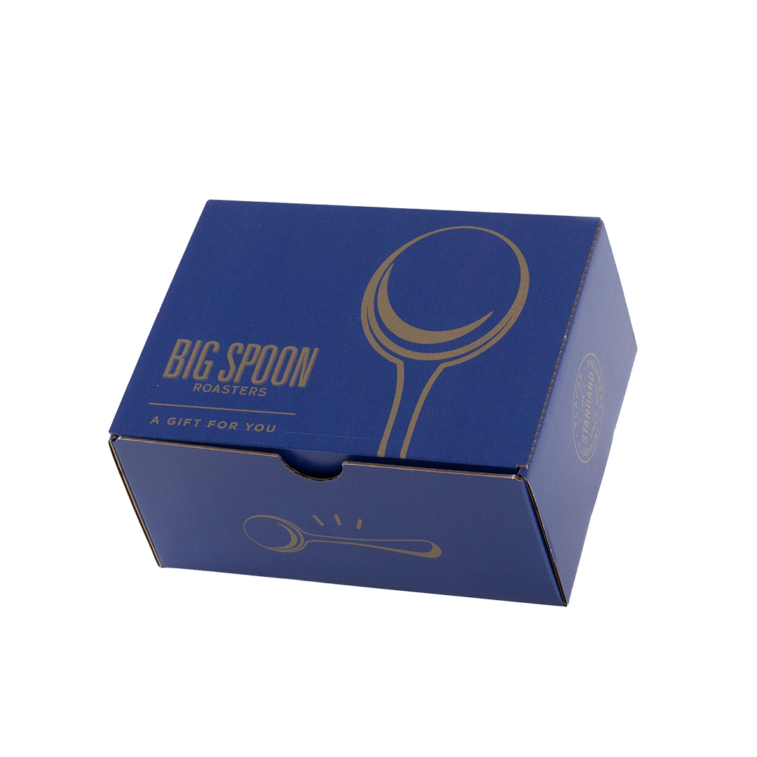 Blue box with Big Spoon Roasters logo and branding