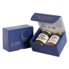Blue gift box with two jars of Big Spoon Roasters nut butter next to a closed blue gift box