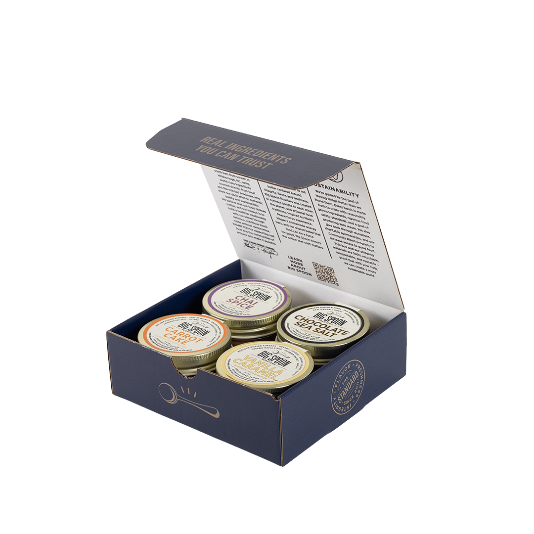 Box of four jars of Big Spoon Roasters nut butter.