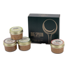 Set of four almond butter jars with 'Big Spoon Roasters' branding in front of a branded box on a white background
