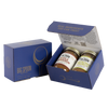 Blue gift box with two jars of Big Spoon Roasters nut butter next to a closed blue gift box