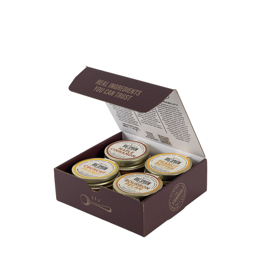 Box with four jars of Big Spoon Roasters peanut butter