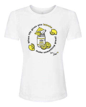 White t-shirt with illustration of jar of nut butter surrounded by lemons 