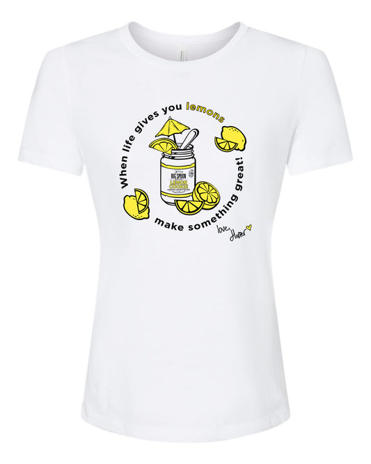 White t-shirt with illustration of jar of nut butter surrounded by lemons 