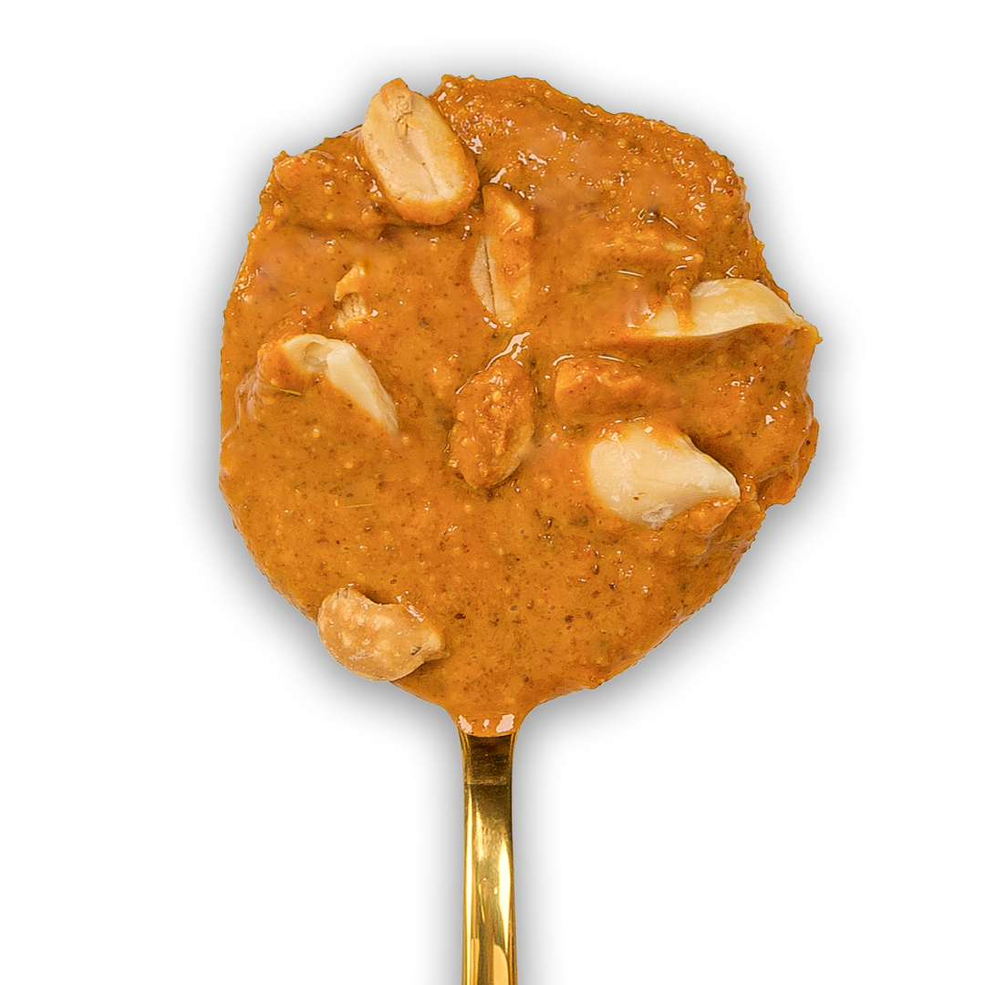 Lum Lum Thai Curry Peanut & Cashew Butter on a golden spoon