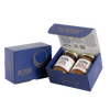 Blue gift box with two jars of Big Spoon Roasters nut butter next to a closed blue gift box