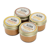 Four jars of Big Spoon Peanut Butter on a white background