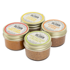 Four jars of Big Spoon nut butters on a white background