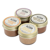 Four jars of Big Spoon nut butter on a white background